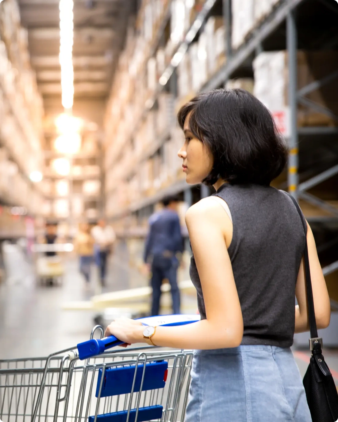 Woman shopping in warehouse store.