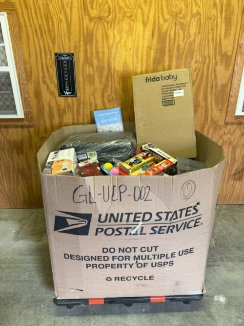 A box of mail sits in front of the door.