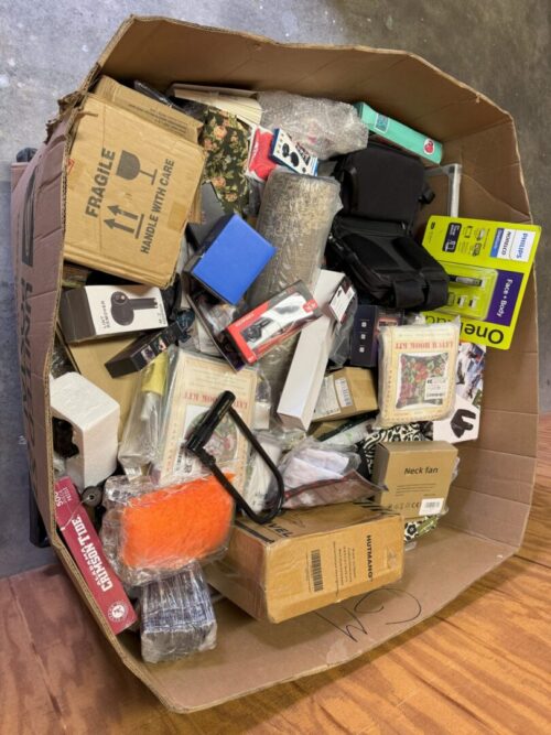 A box of electronics and other items in it.